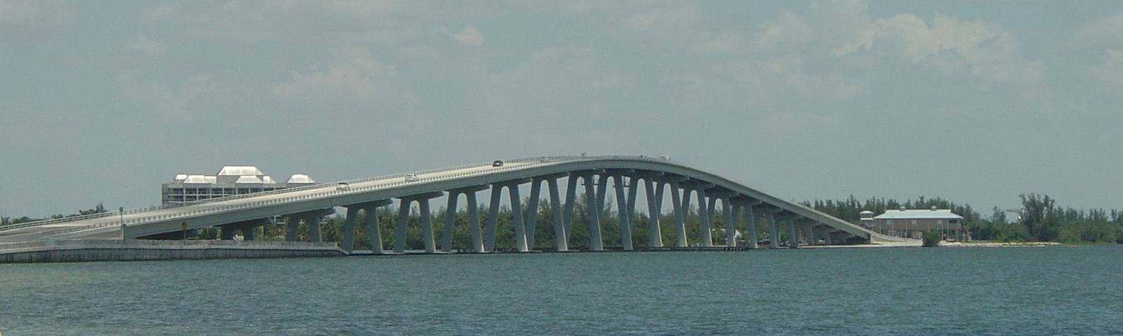The arched bridge of the Sanibel Causeway over the water to Sanibel Island